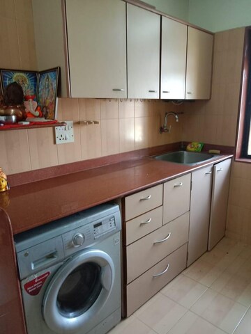 Kitchen in 2 BHK Apartment at Andheri CHS, Andheri West – for Rent