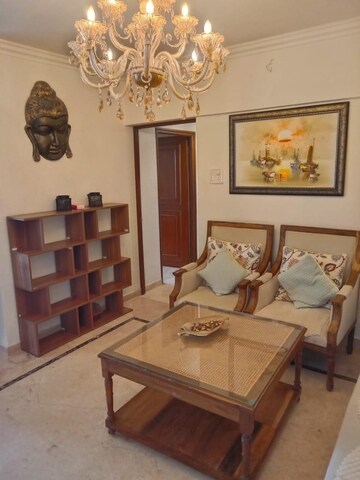 Living Room in 2 BHK Apartment at Andheri CHS, Andheri West – for Rent