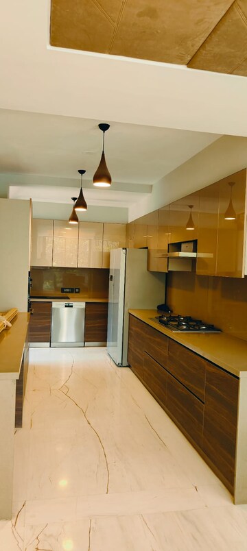 Kitchen in 4 BHK Builder Floor at Suncity – for Rent