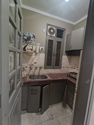 Kitchen in 1 BHK Builder Floor at Khirki Extension – for Rent