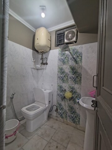Bathroom in 1 BHK Builder Floor at Khirki Extension – for Rent
