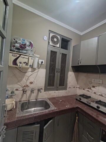 Kitchen in 1 BHK Builder Floor at Khirki Extension – for Rent
