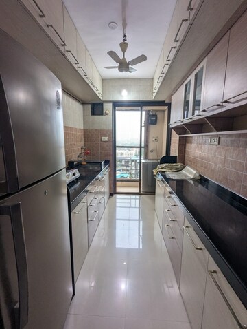 Kitchen in 2 BHK Apartment at Jaydeep Park, Majiwada – for Rent