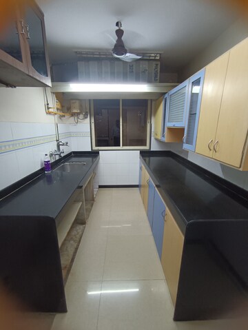 Kitchen in 1 BHK Apartment at Agarwal Trinity Towers, Malad West – for Rent