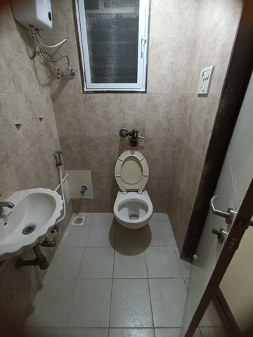 Bathroom in 1 BHK Apartment at Agarwal Trinity Towers, Malad West – for Rent