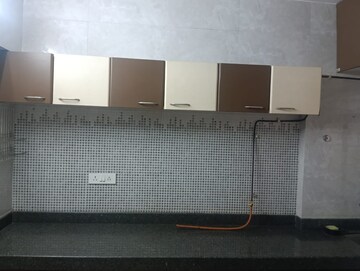 Kitchen in 1 BHK Apartment at Janseva CHS, Goregaon West – for Rent
