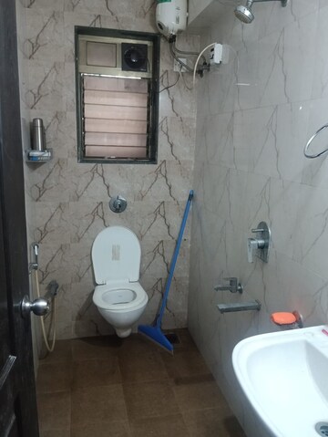 Bathroom in 1 BHK Apartment at Janseva CHS, Goregaon West – for Rent