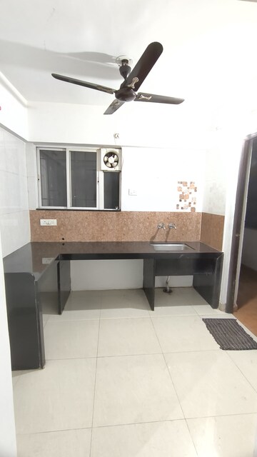 Kitchen in 1 BHK Apartment at Wadgaon Sheri – for Rent