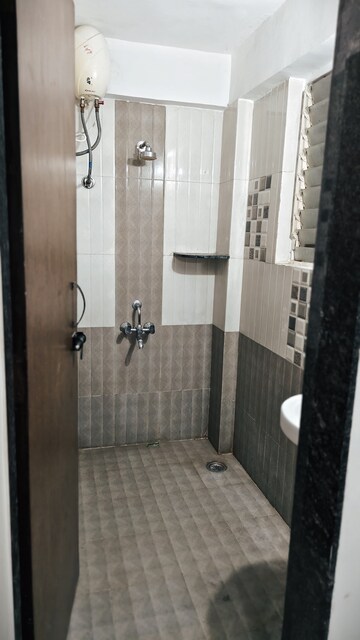 Bathroom in 1 BHK Apartment at Wadgaon Sheri – for Rent