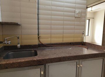 Kitchen in 1 BHK Apartment at Mann Niketan, Malad West – for Rent