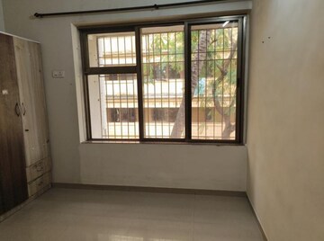 Room in 1 BHK Apartment at Mann Niketan, Malad West – for Rent