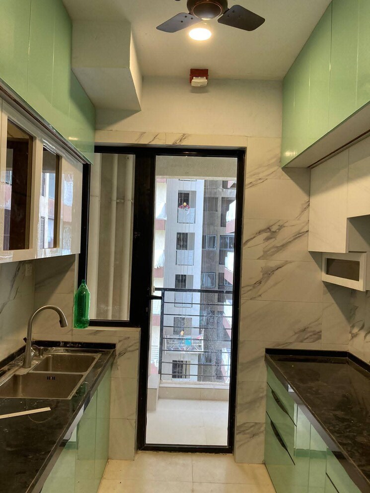 Kitchen, risland-the-icon 2 Bedroom 1000 Sq.Ft. Apartment In Dhokali Thane 9100535