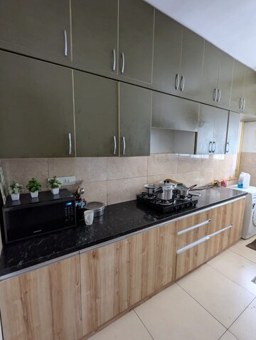 Kitchen in 2 BHK Apartment at Prestige High Fields, Gachibowli – for Sale