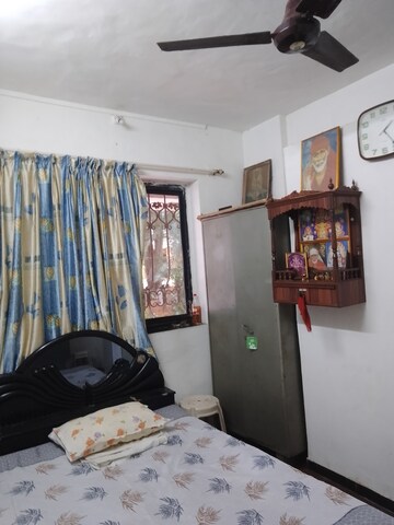 Living Room in 2 BHK Apartment at Golders Green CHS, Borivali West – for Rent
