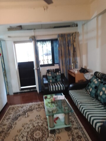 Living Room in 2 BHK Apartment at Golders Green CHS, Borivali West – for Rent