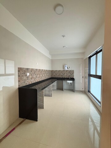 Kitchen in 3 BHK Apartment at Raj Infinia, Malad West – for Sale