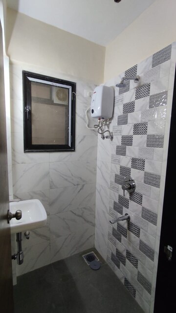 Bathroom in 1 BHK Apartment at Shree Amizara CHS Malad, Malad West – for Rent