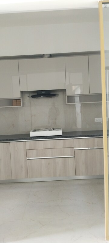 Kitchen in 3.5 BHK Builder Floor at Smart World Orchard, Sector 61 – for Rent