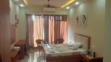 Living Room in Studio Apartment at Gaur City Center, Sector 4 Greater Noida – for Rent