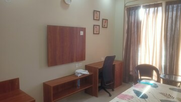 Living Room in Studio Apartment at Gaur City Center, Sector 4 Greater Noida – for Rent