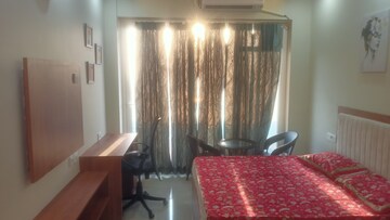 Living Room in Studio Apartment at Gaur City Center, Sector 4 Greater Noida – for Rent