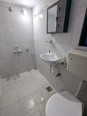 Bathroom in 2 BHK Apartment at Jaydeep Park, Majiwada – for Rent