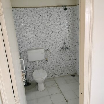 Bathroom in 3.5 BHK Apartment at Nandakini Alaknanda Estate, Amar Shaheed Path – for Sale