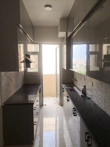 Kitchen in 2 BHK Apartment at Signature The Millennia 2, Sector 37d – for Rent