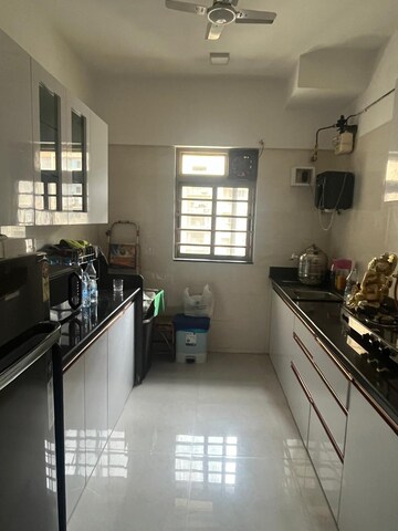 Kitchen in 2 BHK Apartment at Sheth Vasant Oasis, Andheri East – for Rent
