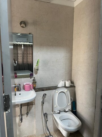 Bathroom in 2 BHK Apartment at Sheth Vasant Oasis, Andheri East – for Rent
