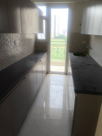 Kitchen in 2 BHK Apartment at Signature The Millennia 2, Sector 37d – for Rent