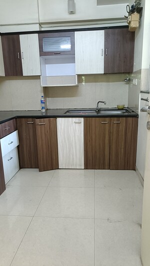 Kitchen in 2 BHK Apartment at Hiranandani Estate Queens Gate, Ghodbunder Road – for Rent