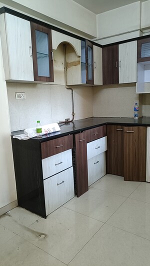 Kitchen in 2 BHK Apartment at Hiranandani Estate Queens Gate, Ghodbunder Road – for Rent
