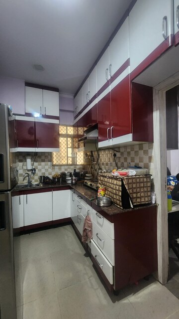 Kitchen in 2 BHK Apartment at Gaur City 2 - 10th Avenue, Sector 16c Greater Noida – for Rent