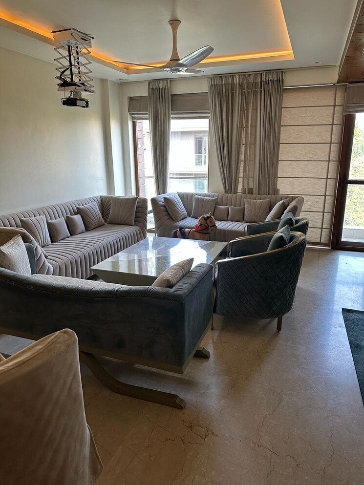 Living Room, panchsheel park 4 Bedroom 500 Sq.Yd. Builder Floor In Panchsheel Park Delhi 9101495