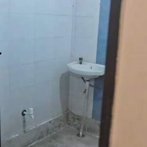 Bathroom in 2 BHK Builder Floor at Rohini Sector 24 – for Sale