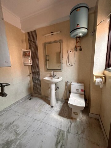 Bathroom in 3 BHK Apartment at Palm Residency Chhatarpur, Chattarpur – for Rent