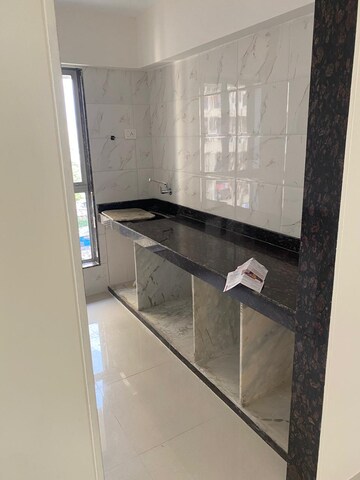Kitchen in 1 BHK Apartment at Dharti Pressidio, Kandivali West – for Sale