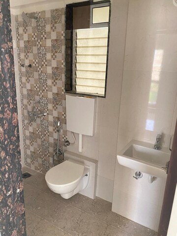Bathroom in 1 BHK Apartment at Dharti Pressidio, Kandivali West – for Sale