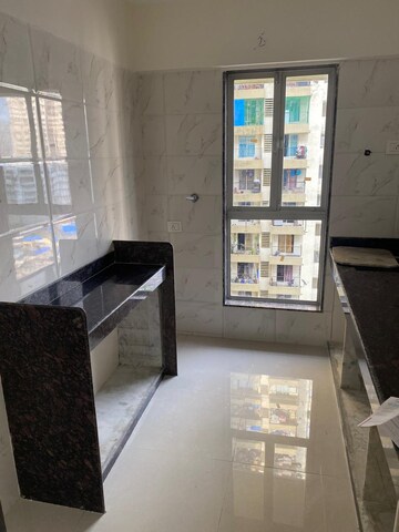 Kitchen in 1 BHK Apartment at Dharti Pressidio, Kandivali West – for Sale