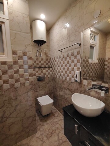 Bathroom in 3 BHK Builder Floor at RWA Chittaranjan Park Block R, Chittaranjan Park – for Rent