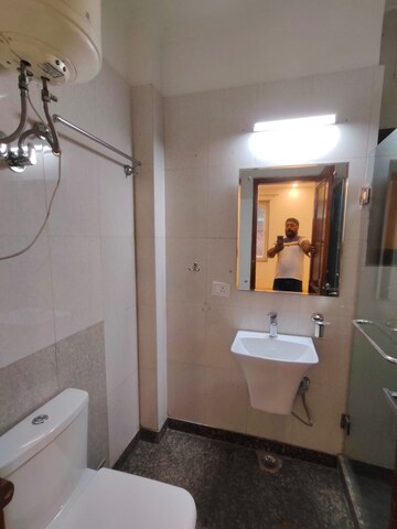 Bathroom in 3 BHK Builder Floor at RWA Chittaranjan Park Block R, Chittaranjan Park – for Rent