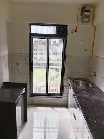 Kitchen in 2 BHK Apartment at Oxford Navrang Crystal, Goregaon West – for Rent
