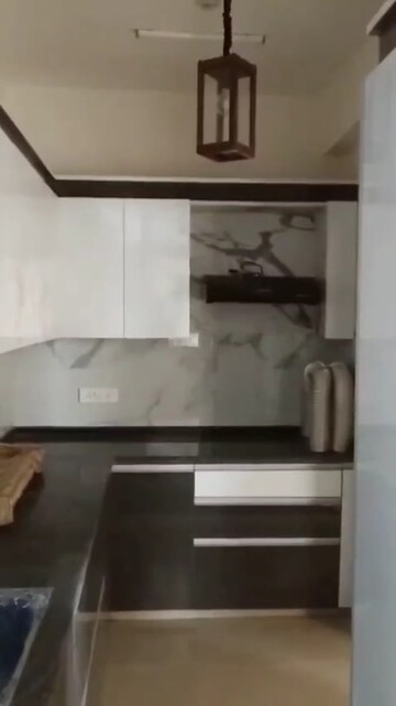 Kitchen in 2.5 BHK Apartment at Mahagun Mywoods, Sector 16c Greater Noida – for Sale