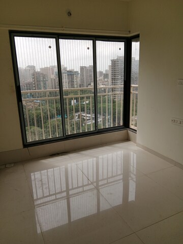 Room in 2 BHK Apartment at Oxford Navrang Crystal, Goregaon West – for Rent