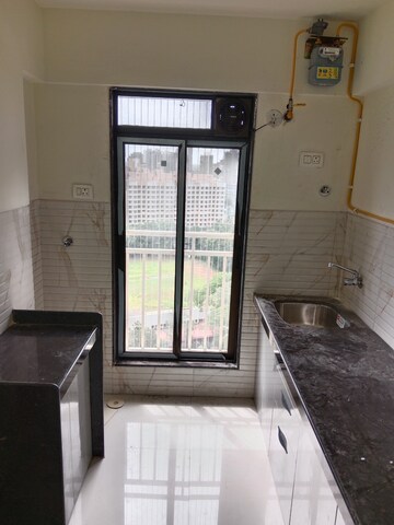 Kitchen in 2 BHK Apartment at Oxford Navrang Crystal, Goregaon West – for Rent