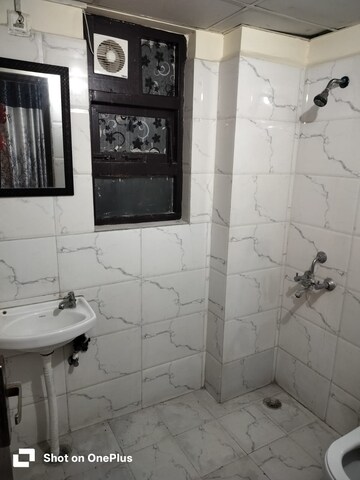 Bathroom in 3 BHK Apartment at Auric City Homes, Sector 82 – for Rent