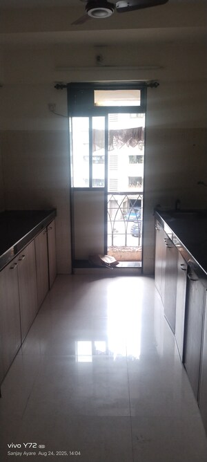 Kitchen in 2 BHK Apartment at Globe Heights, Goregaon East – for Sale