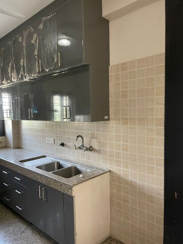 Kitchen in 2 BHK Apartment at Hawelia Valencia Homes, Sector 1 Greater Noida – for Rent