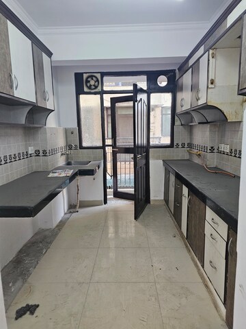 Kitchen in 3 BHK Apartment at Sector 18a Dwarka – for Sale